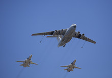 VKS Russian Airforce Tanker Jet Aircraft (Il-78) And Two Jet (Sukhoi Su-24 (Fencer) Bombers With External Tanks Attached To Pylons.