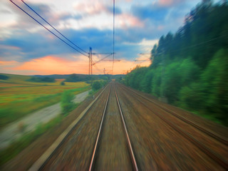 Wall Mural - Scenic railroad sunset with motion blur