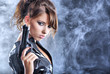 © ZoomTeam - beautiful sexy girl holding gun . smoke background