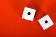 dices on red background - one one
