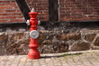Hydrant vor einem Fachwerkhaus