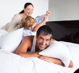 Wall Mural - Family playing with pillows