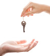 Close-up of handing over a key