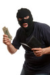 © Anton Gvozdikov - Surprised robber takes money from stolen wallet.