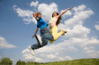 © Eduard Stelmakh - Happy teens - jumping under blue sky. Soft focus. Focus on eyes