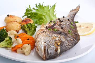 Wall Mural - Sea Bream fish with vegetables