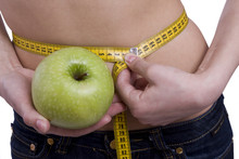Waist Is 65.5 Centimeters. Fit Woman With Measure Tape And Apple