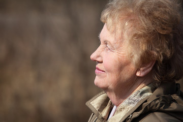 Wall Mural - Profile of aged woman