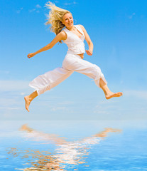 Poster - Girl in white jumping happily