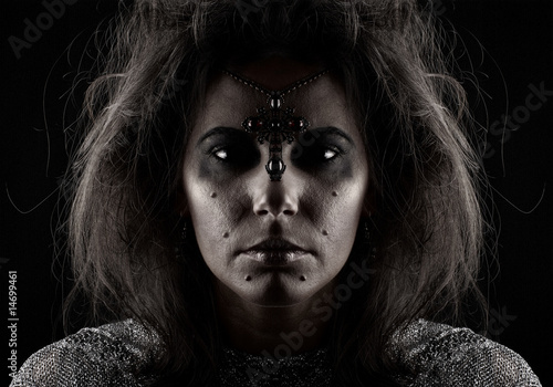 Fotografía Portrait of witch over dark background