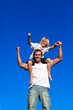 © WavebreakMediaMicro - Strong child sitting on his father's shoulders