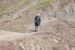 © Anton Gvozdikov - Backpacker hikes on a desert path
