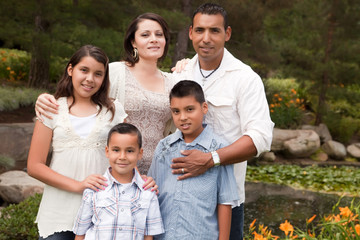 Wall Mural - Happy Hispanic Family In the Park