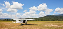 Cessna Plane On The Unpaved Airfield