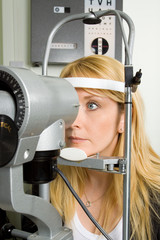 Young woman having eye test