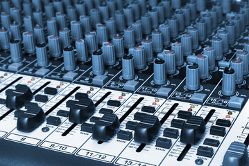 closeup of a audio mixing board