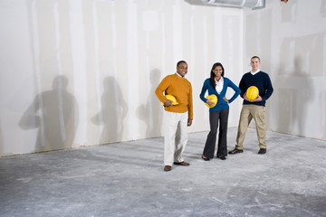  Multi-ethnic people in office space ready for buildout