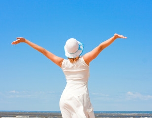 Canvas Print - Girl in white under the sun