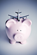 Piggy Bank With Toy Airplane