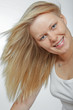 © Starpics - Portrai of a young lady, hair in the wind