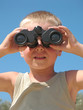 © Photobank - child looking through binoculars