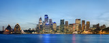 Fototapeta Londyn - Panoramic view of Sydney skyline with blue sky