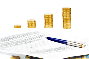 stack of coins and documents