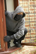 © Monkey Business - Young Man Breaking Into House