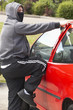 © Monkey Business - Young Man Breaking Into Car