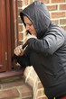 © Monkey Business - Young Woman Breaking Into House