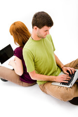 Young man and girl with laptop computer