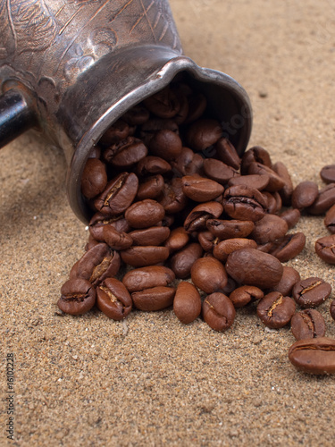 Naklejka - mata magnetyczna na lodówkę Cezve and coffee beans closeup view