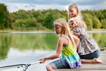 Wall Mural - The girls are fishing