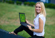© bertys30 - woman with recycle logo on laptop