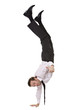 © emprise - Businessman doing handstand and giving a thumbs up