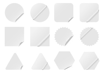 Wall Mural - Set of blank white stickers isolated on white background.
