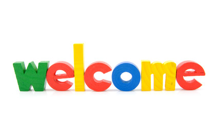 colorful wooden letters with the word welcome