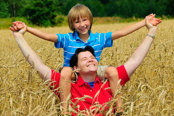 Wall Mural - Family in wheat field