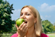 © mitarart - woman eating apple
