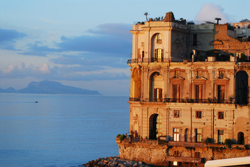 palazzo donn anna con l isola di capri sullo sfondo - napoli