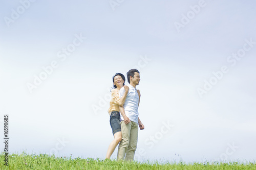 男性の後ろから抱きつく女性 Stock Photo Adobe Stock