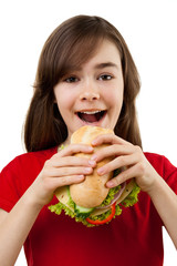 Wall Mural - Kid eating healthy sandwich isolated on white