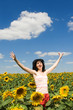 © Dmytro Sunagatov - fun woman in the field of sunflowers