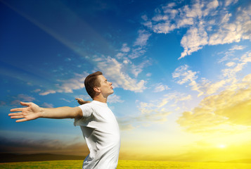 Canvas Print - young man and sunset