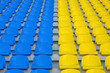 Blue and yellow empty stadium seats