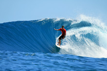 Surfer Riding Perfect Tropical Blue Wave, Mentawai, Indonesia