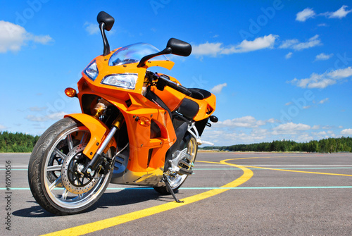 Fotografija  Single motorcycle parking