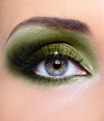 © Valua Vitaly - Make-up of woman eye with khaki eyeshadows