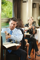 Canvas Print - Businessman waiting in cafe