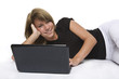 © Steven Vona - Young girl with netbook